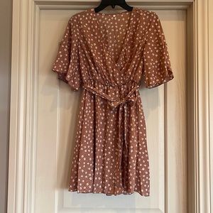 Light, flowy mauve floral dress with v neck. Loops attached for tie belt